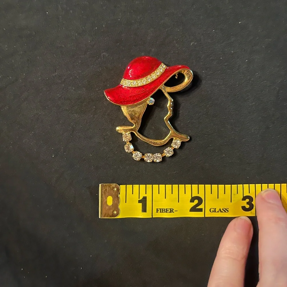 Vintage Unique Lady in Profile Brooch with Red enamel and dangling rhinestones